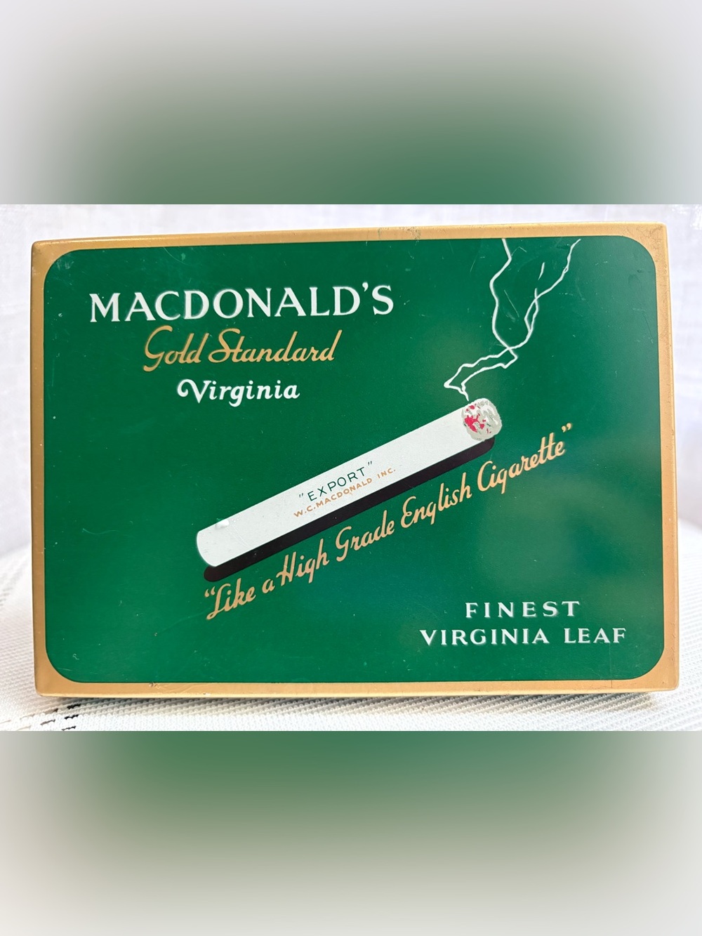 Vintage 1950s Macdonald’s Export Gold Standard cigarette tin.